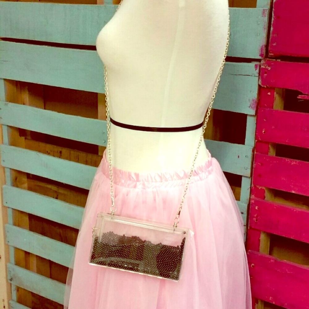 Clear purse clutch with detachable gold strap